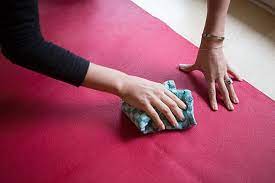 Figure 16 Cleaning a yoga mat